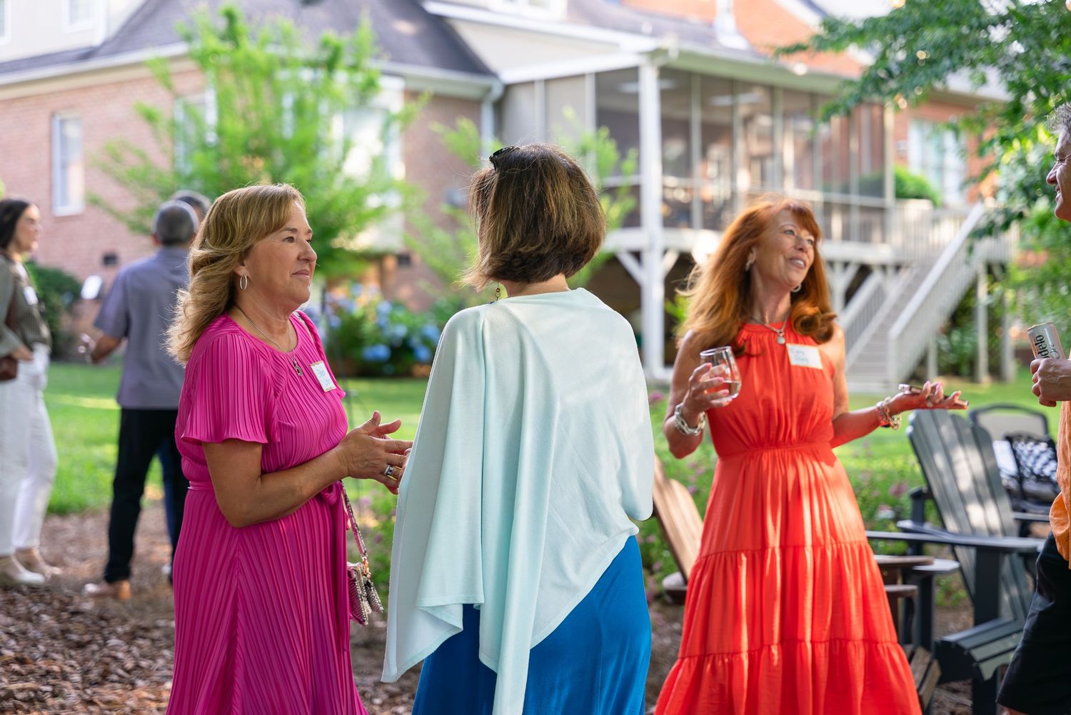 Event photograph of a group of women talking.