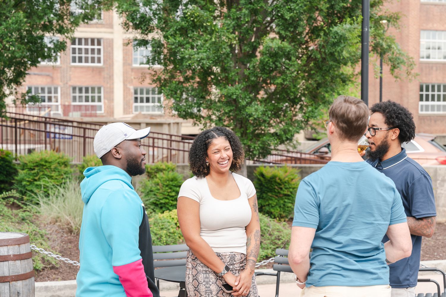 Photograph of people talking at an event in Greensboro, NC.