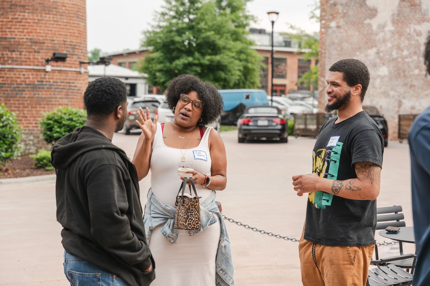 Event photograph of a group of people talking.