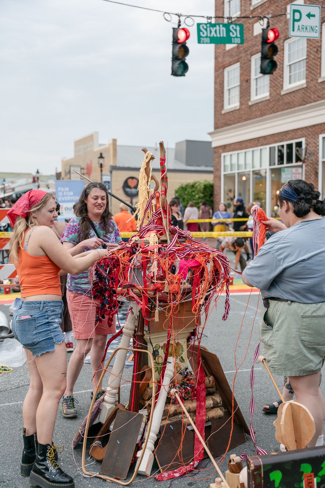 Event photograph of a girl working on a sculpture.