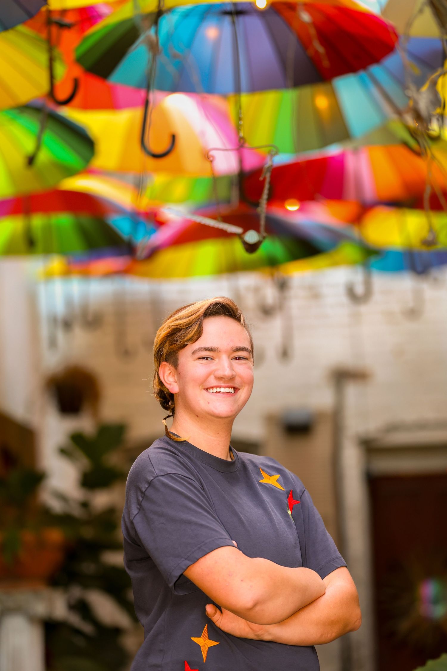 Senior portrait in a colorful indoor space