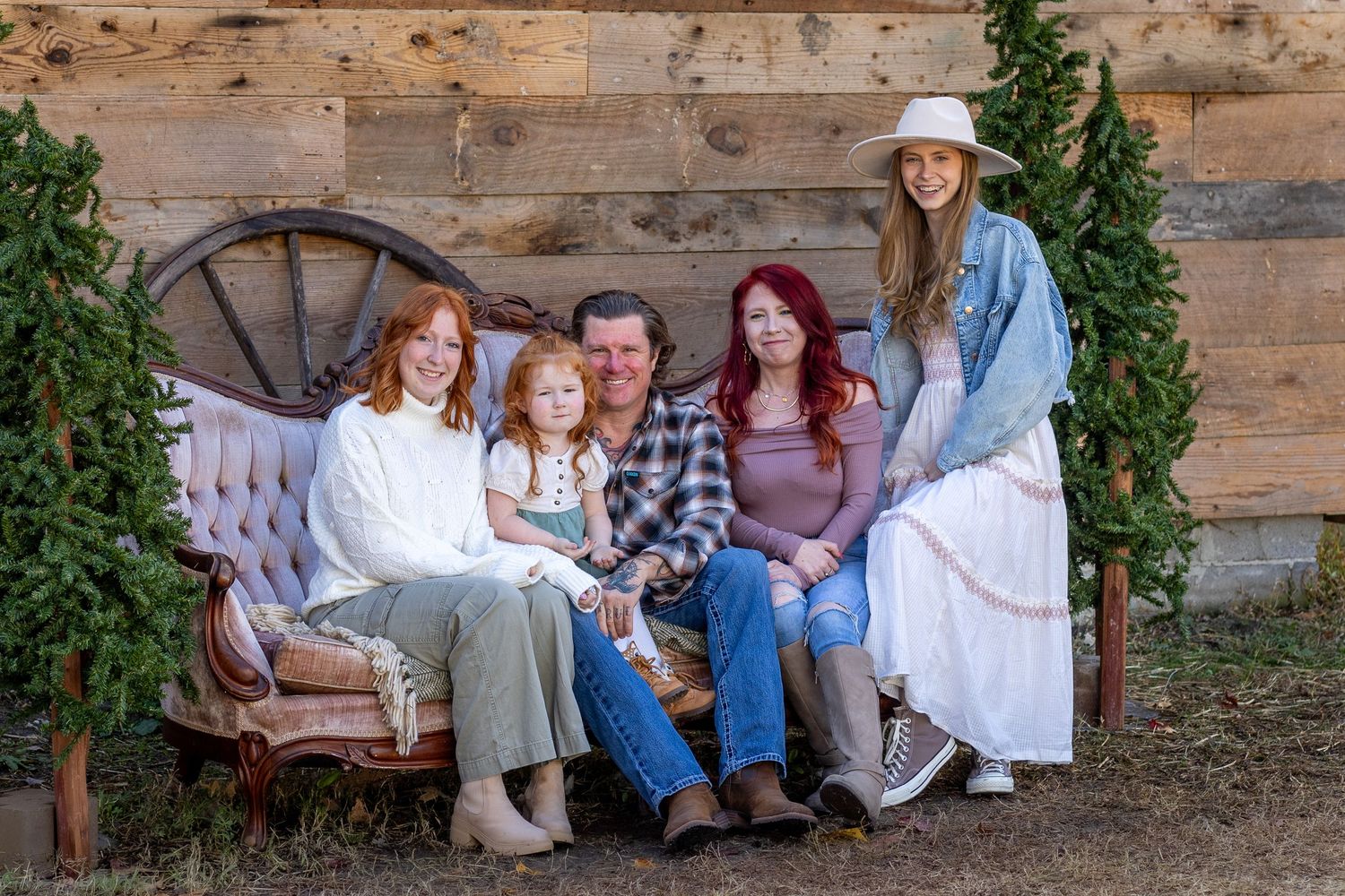 Family portrait session with multiple generations outdoors