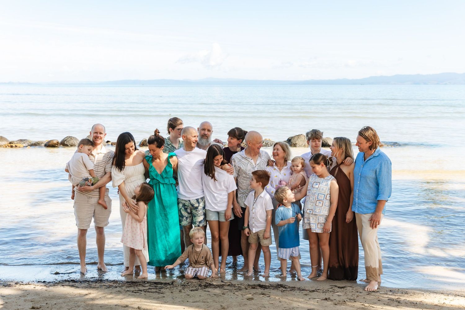 Happy family enjoying a Fiji beach photography session in Fiji. Extended full family photography in fiji