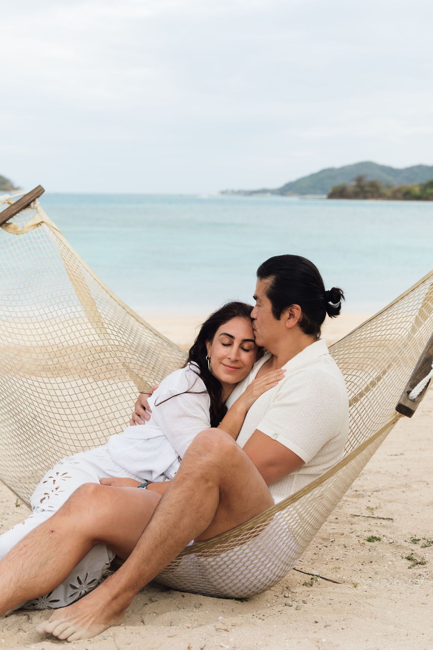 Couple enjoying a romantic beach photography session in Fiji