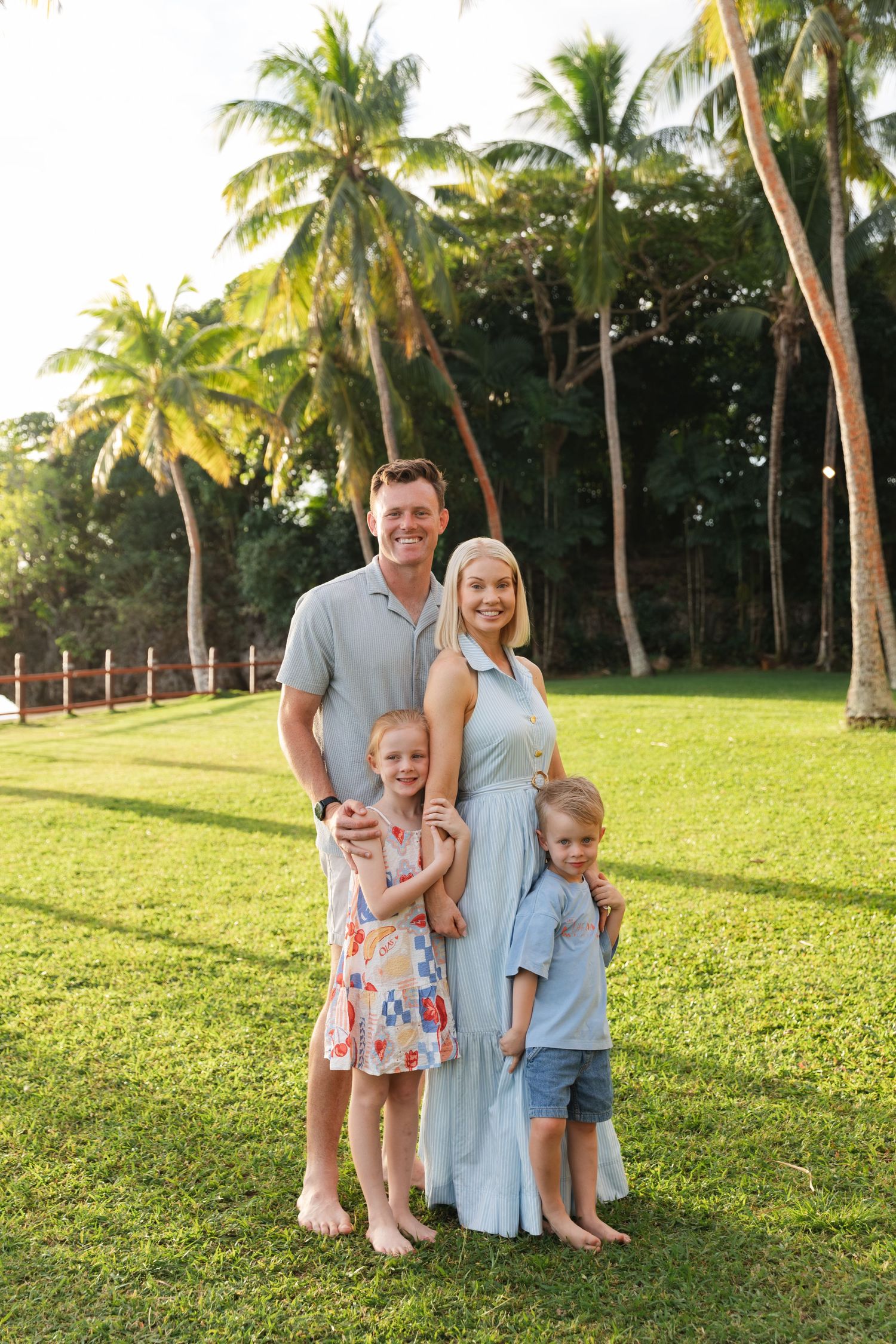 Happy family enjoying a Fiji beach photography session in Fiji