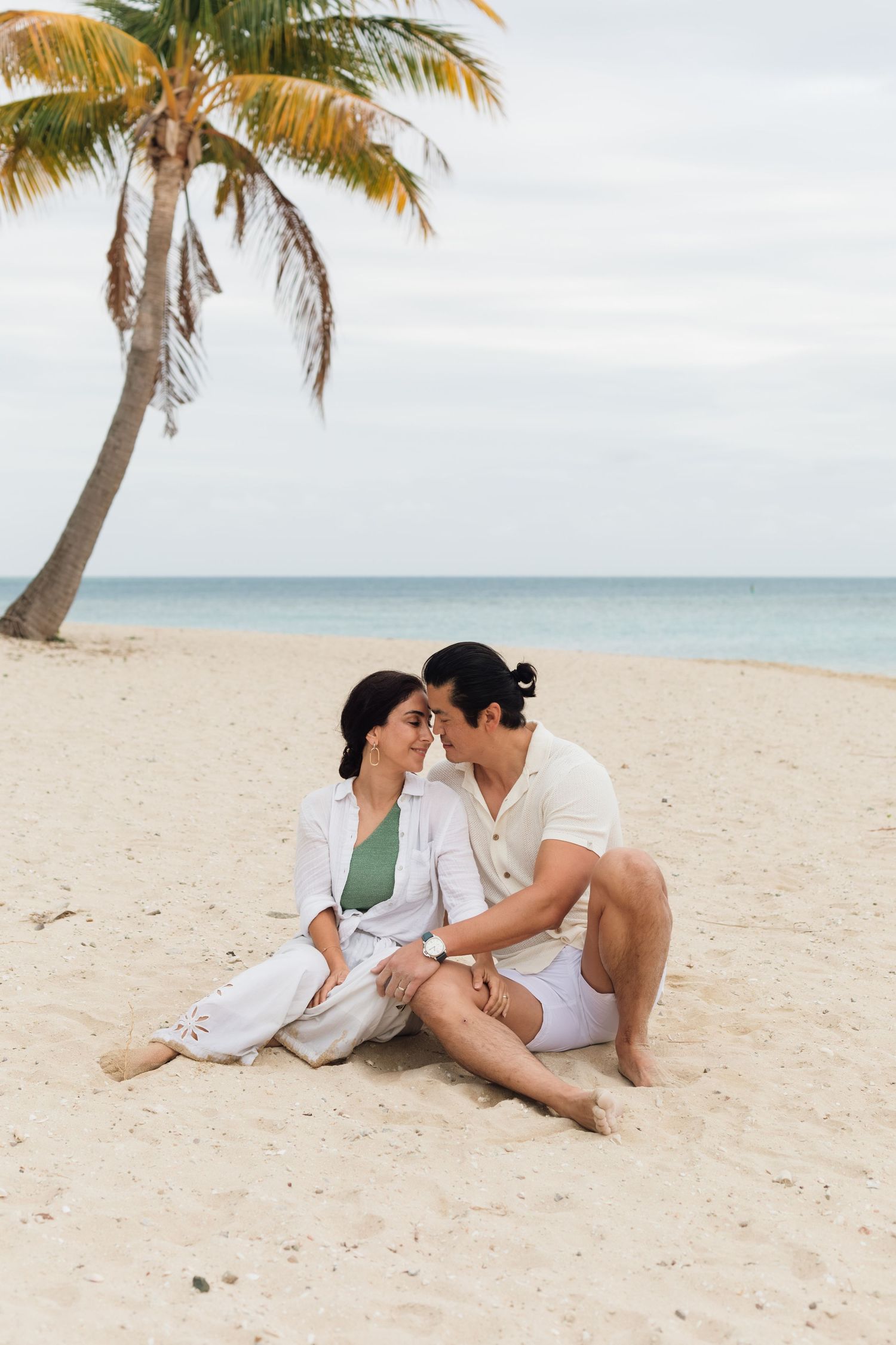 Couple enjoying a romantic beach photography session in Fiji