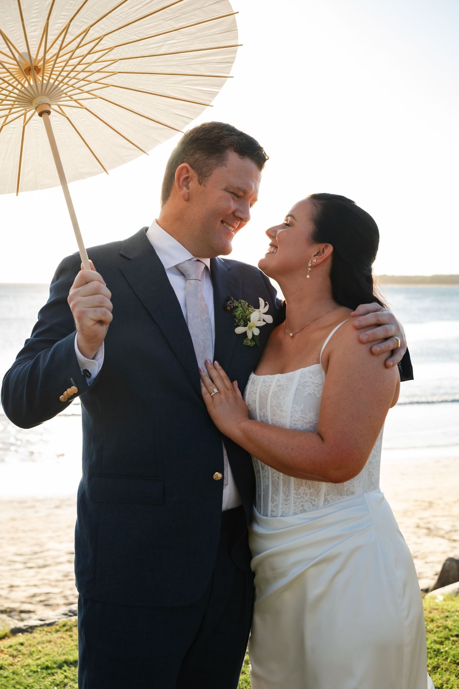 Fiji destination wedding photography capturing a couple celebrating by the ocean