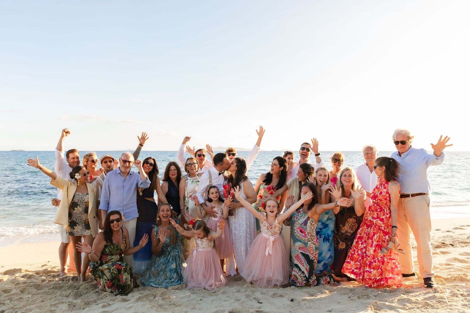 Fiji destination wedding photography capturing a couple celebrating by the ocean