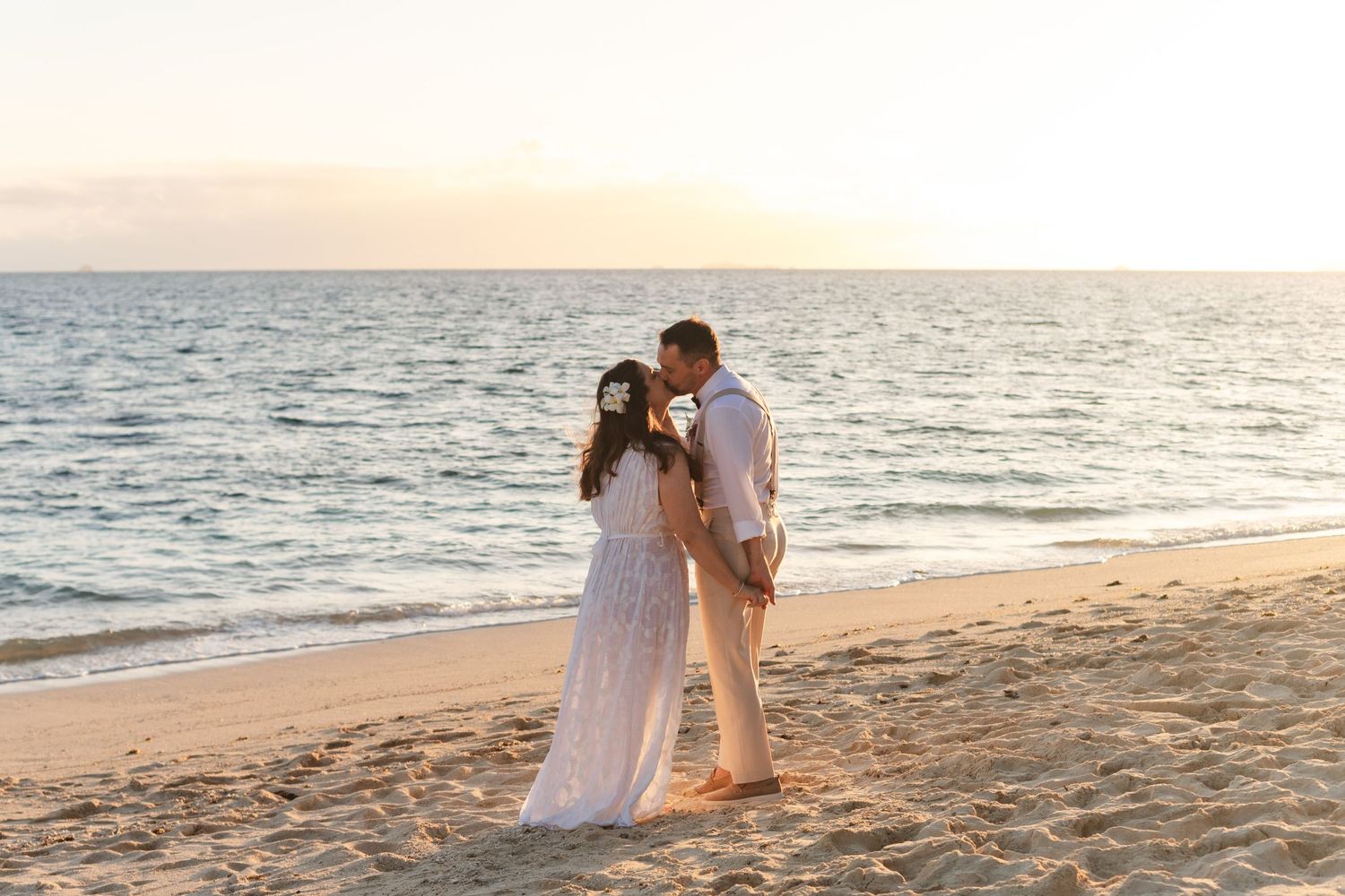 Fiji destination wedding photography capturing a couple celebrating by the ocean