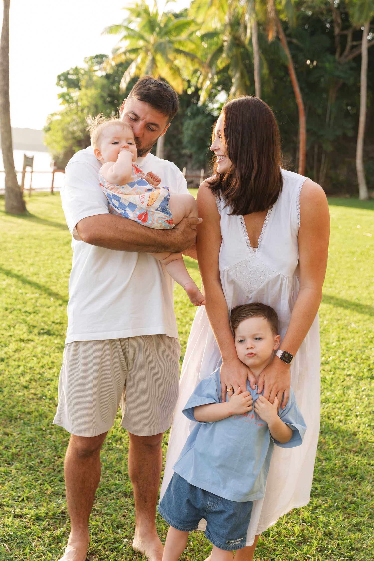 Happy family enjoying a Fiji beach photography session in Fiji