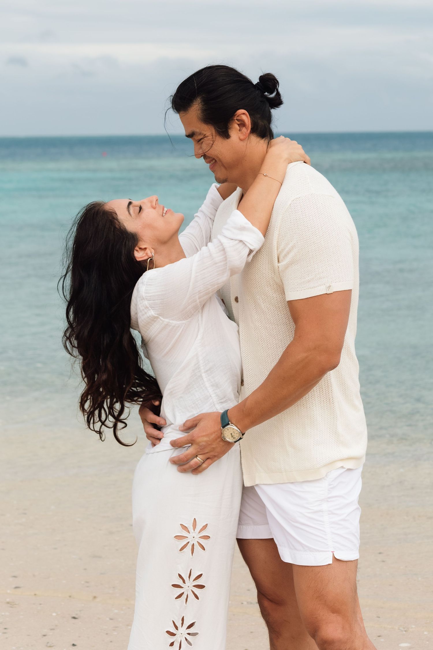 Couple enjoying a romantic beach photography session in Fiji