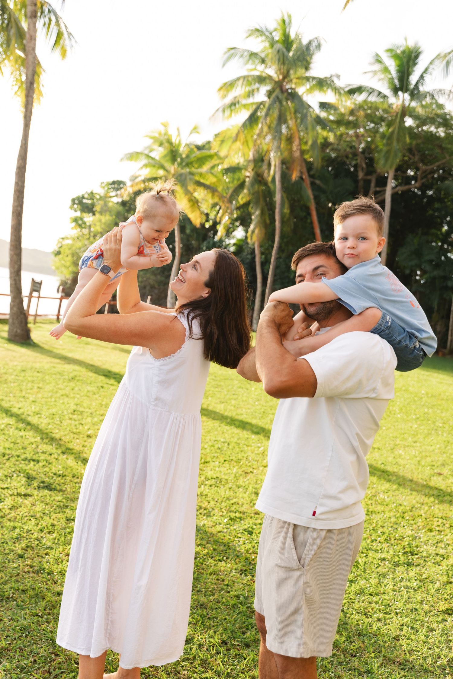 Happy family enjoying a Fiji beach photography session in Fiji