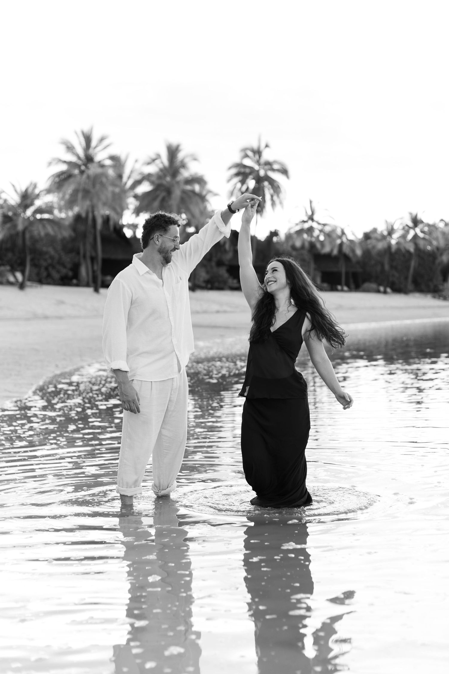 Fiji proposal couple enjoying a romantic beach photography session in Fiji