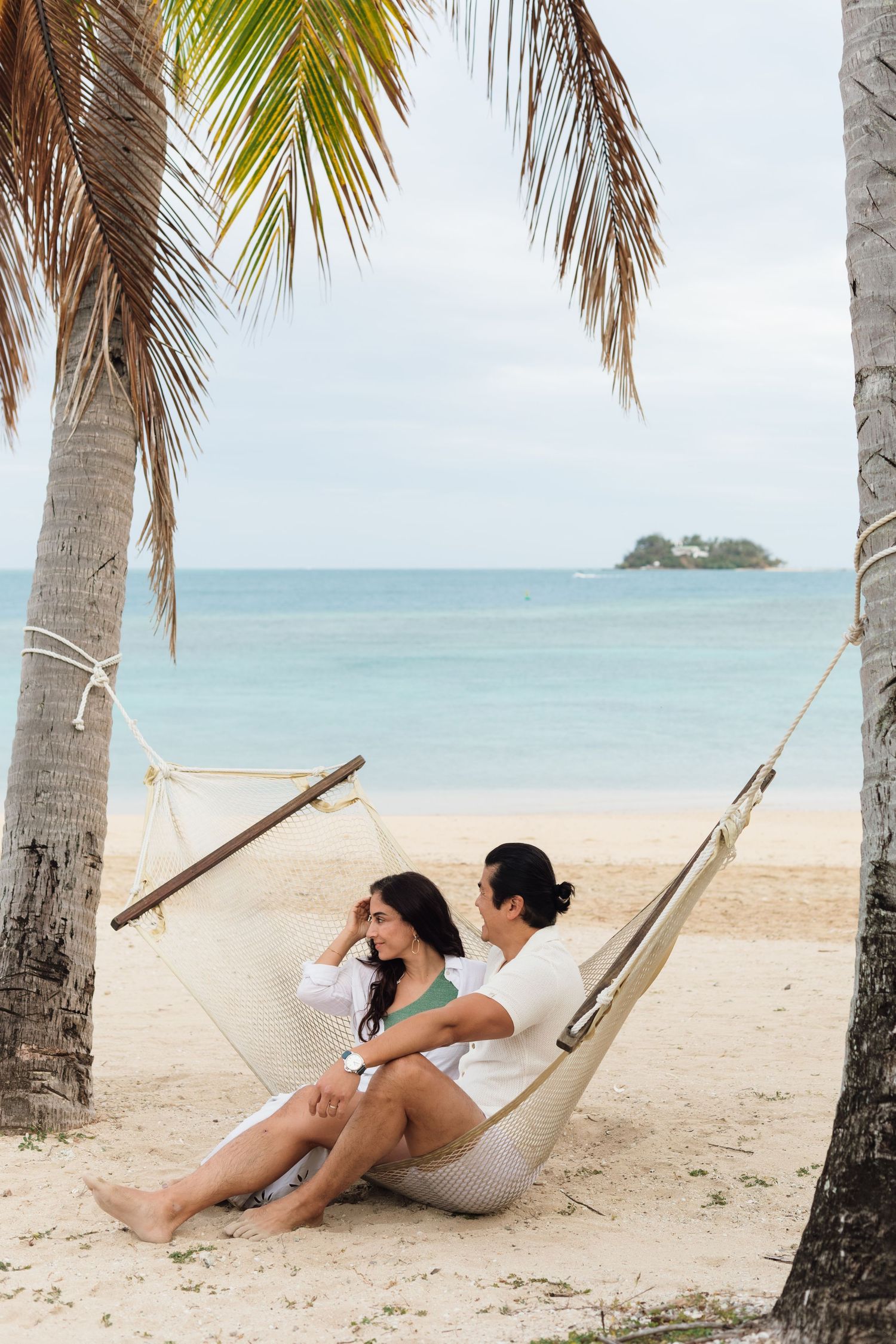 Couple enjoying a romantic beach photography session in Fiji