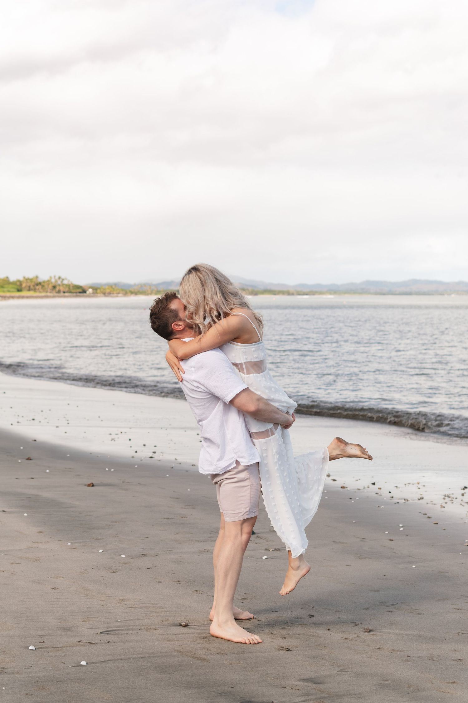 Fiji proposal couple enjoying a romantic beach photography session in Fiji