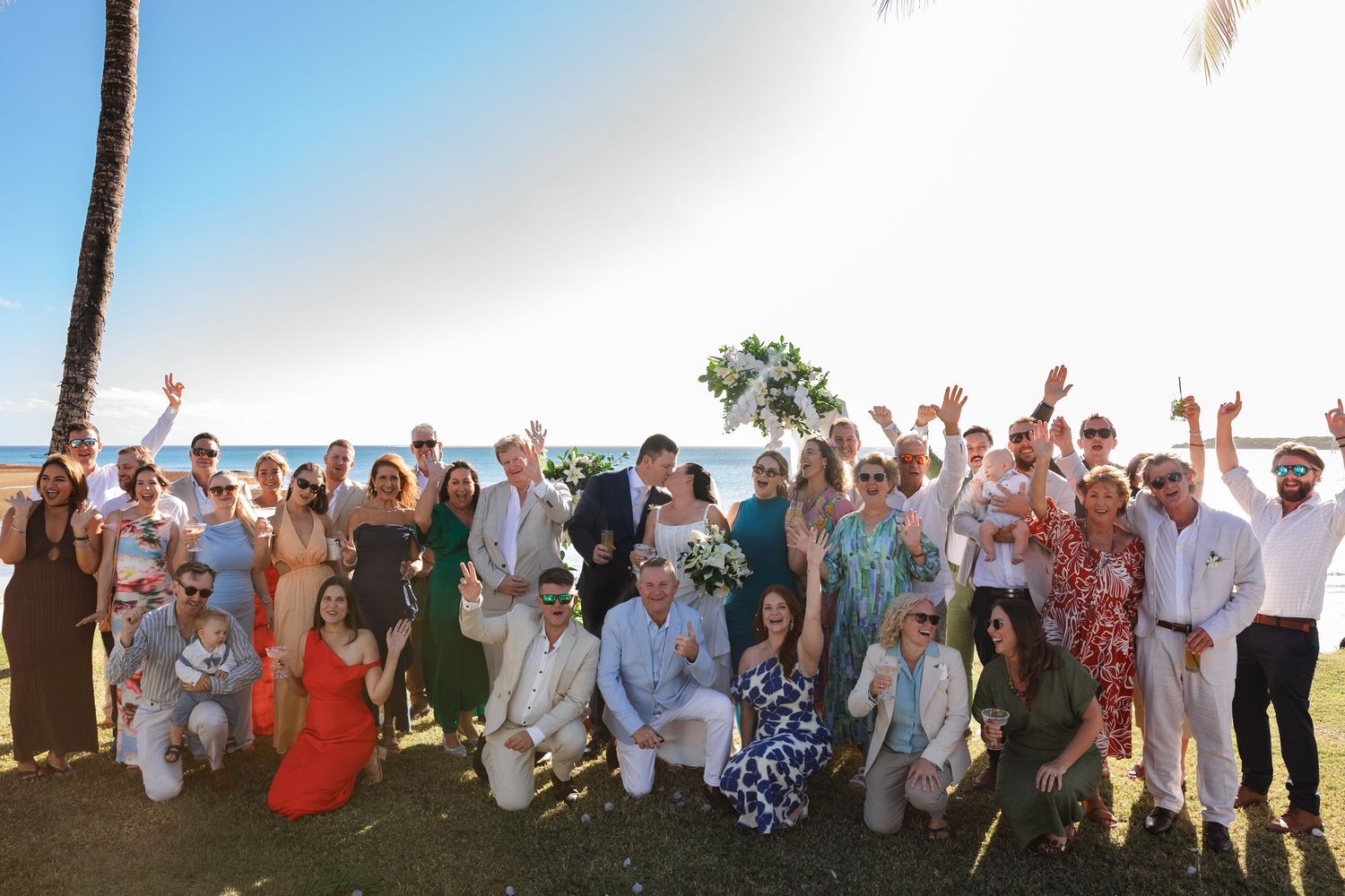 Fiji destination wedding photography capturing a couple celebrating by the ocean
