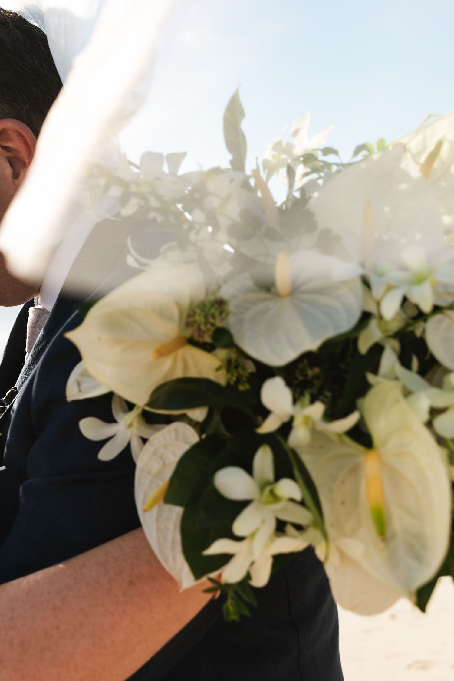 Fiji destination wedding photography capturing a couple celebrating by the ocean