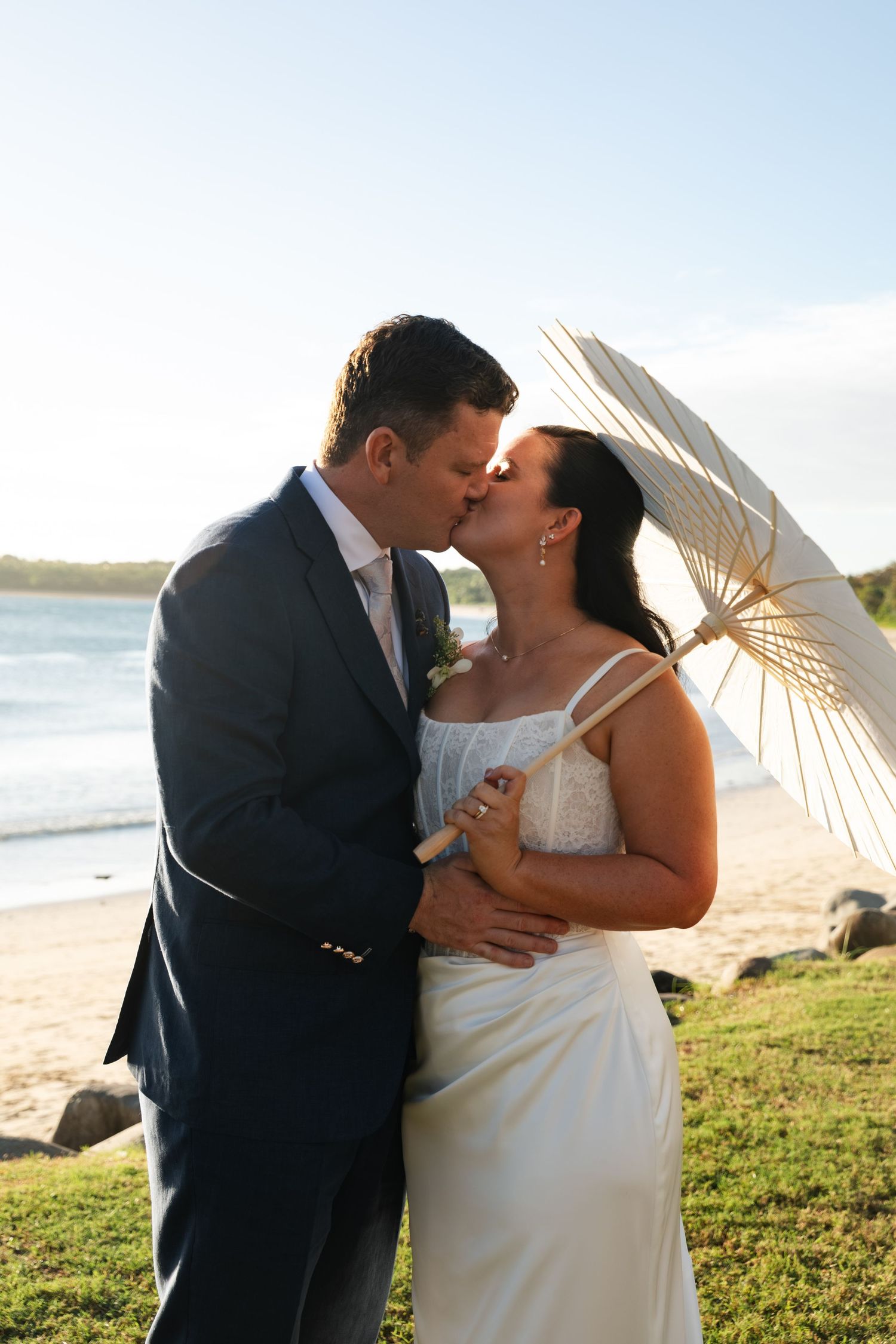 Fiji destination wedding photography capturing a couple celebrating by the ocean