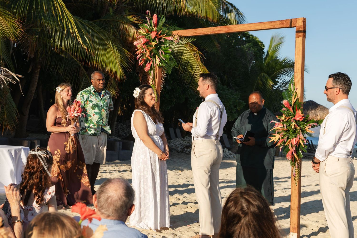 Fiji destination wedding photography capturing a couple celebrating by the ocean