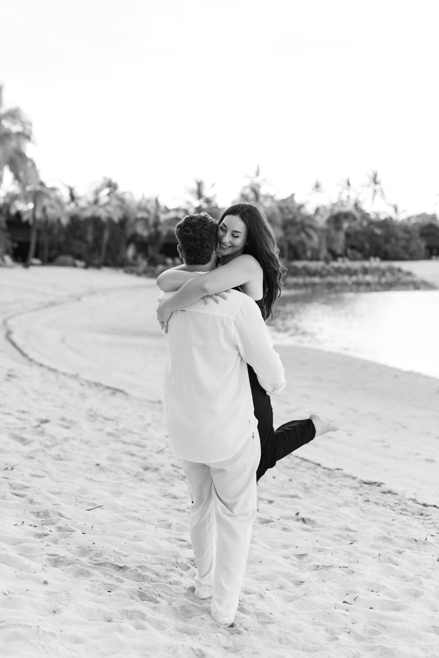 Fiji proposal couple enjoying a romantic beach photography session in Fiji