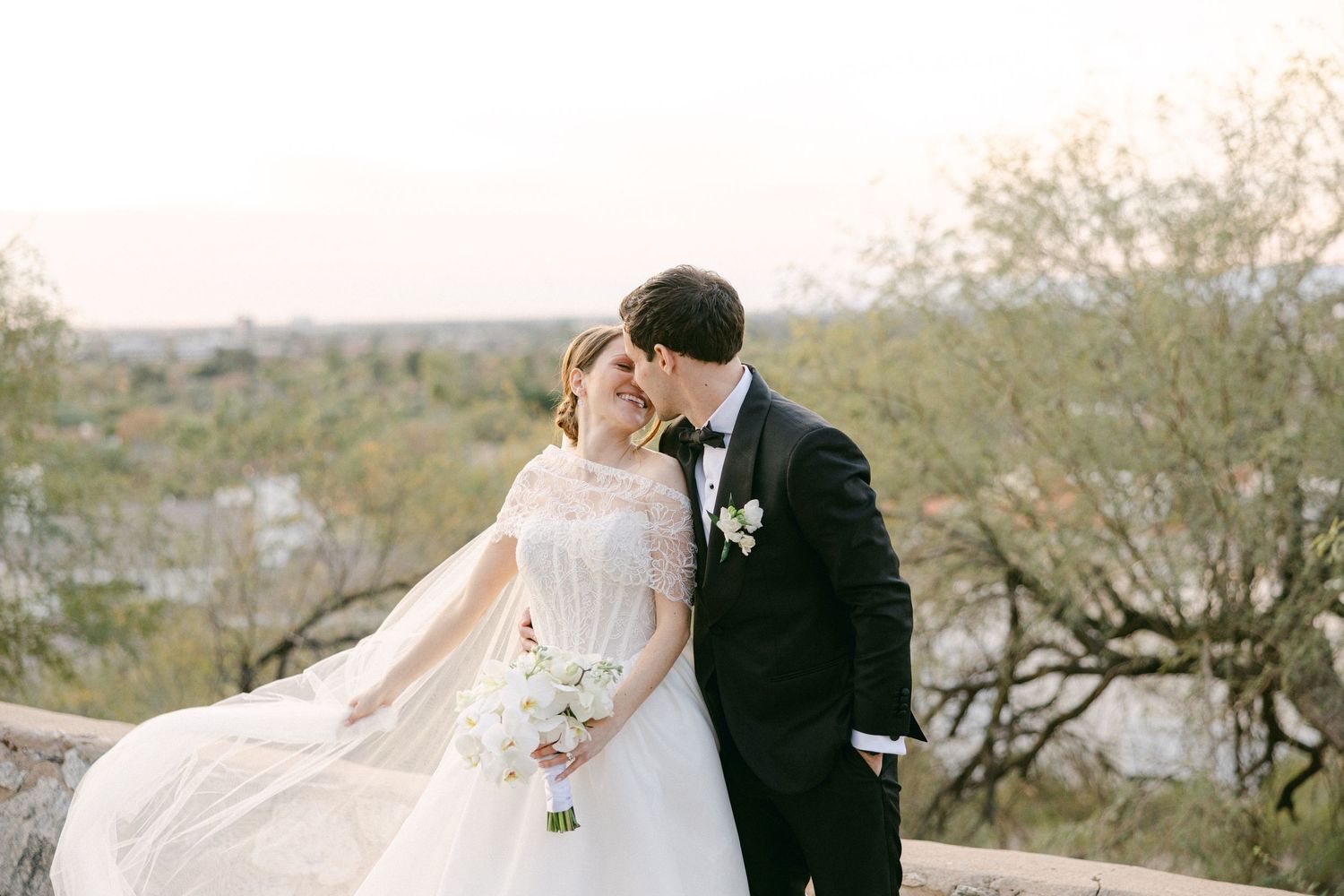 Couple kissing at the Wrigley Mansion