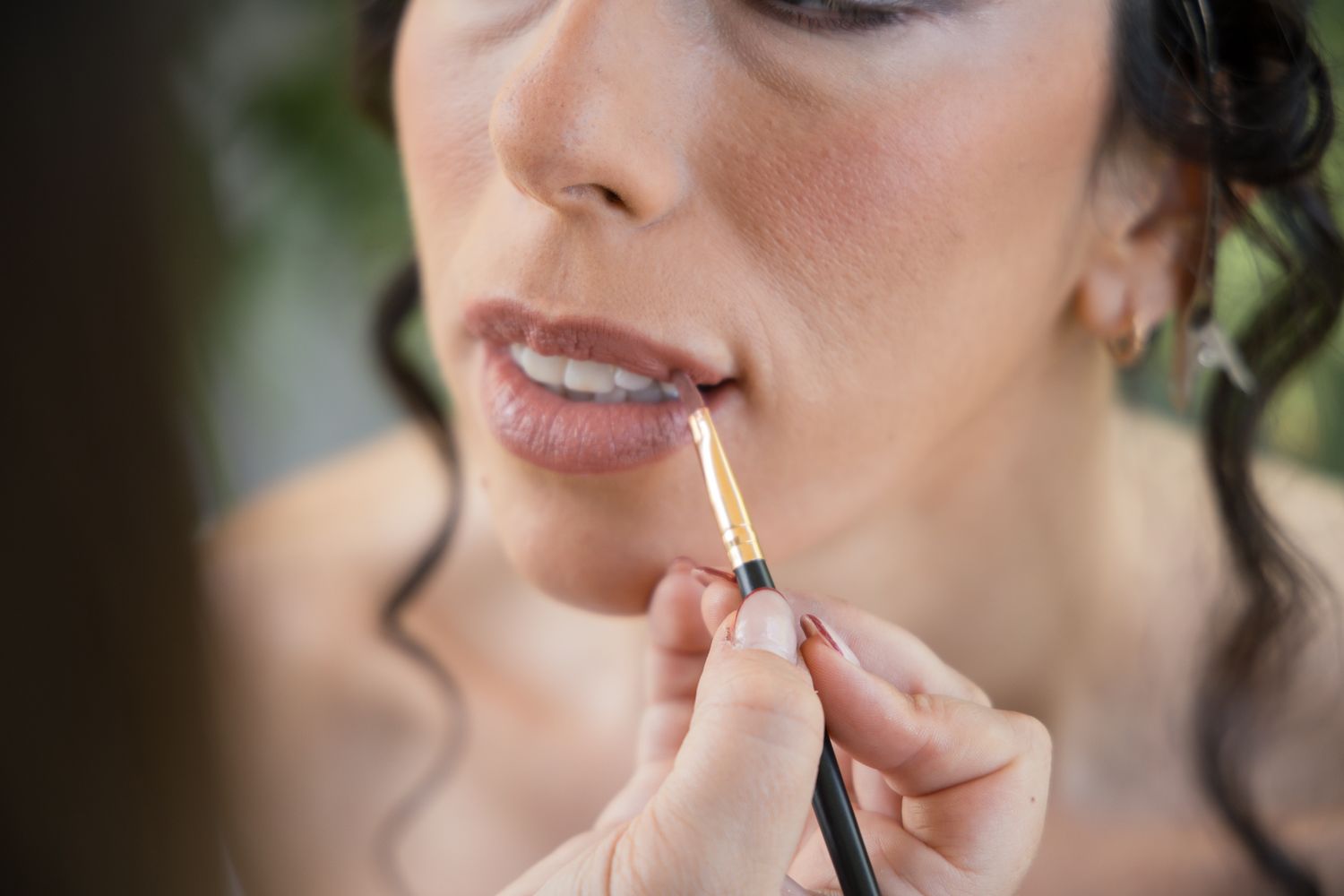 Close-up detail shots of makeup application and lipstick.