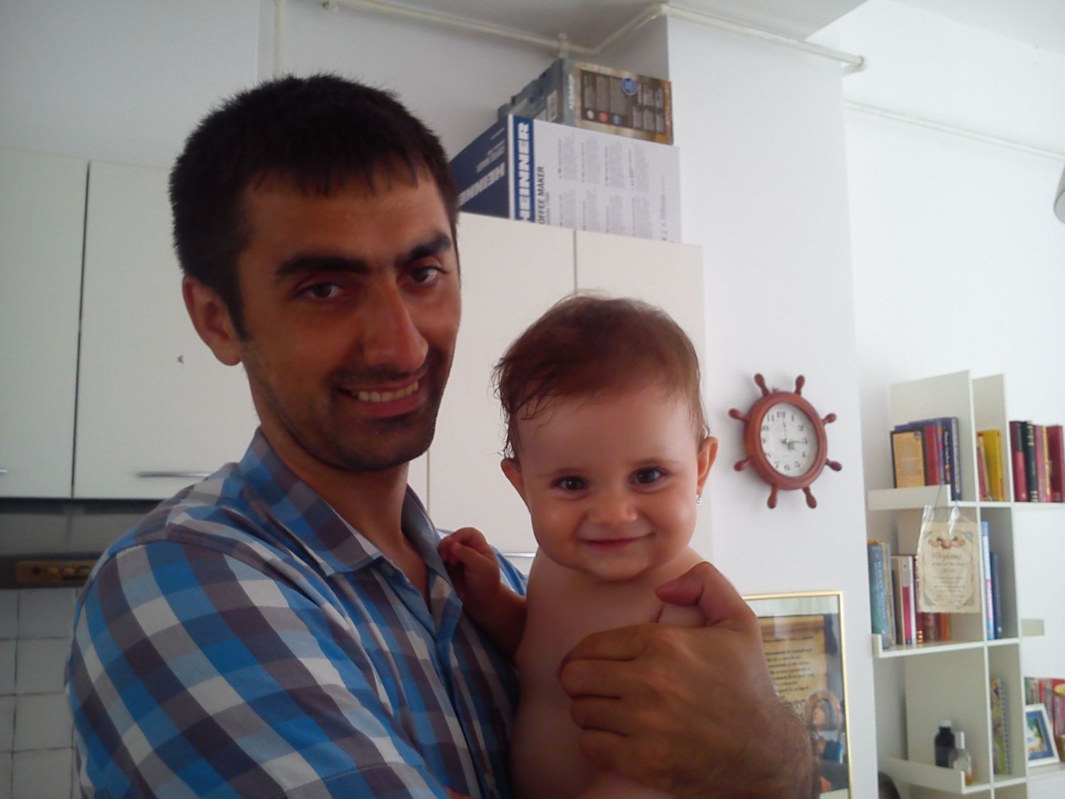 A series of indoor photos showing interactions with a small baby in a bright room with bookshelves.