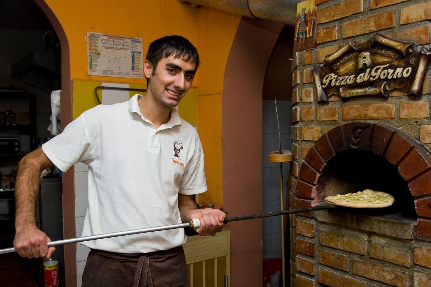 A sequence of photos showing someone preparing food in a rustic kitchen with brick walls.