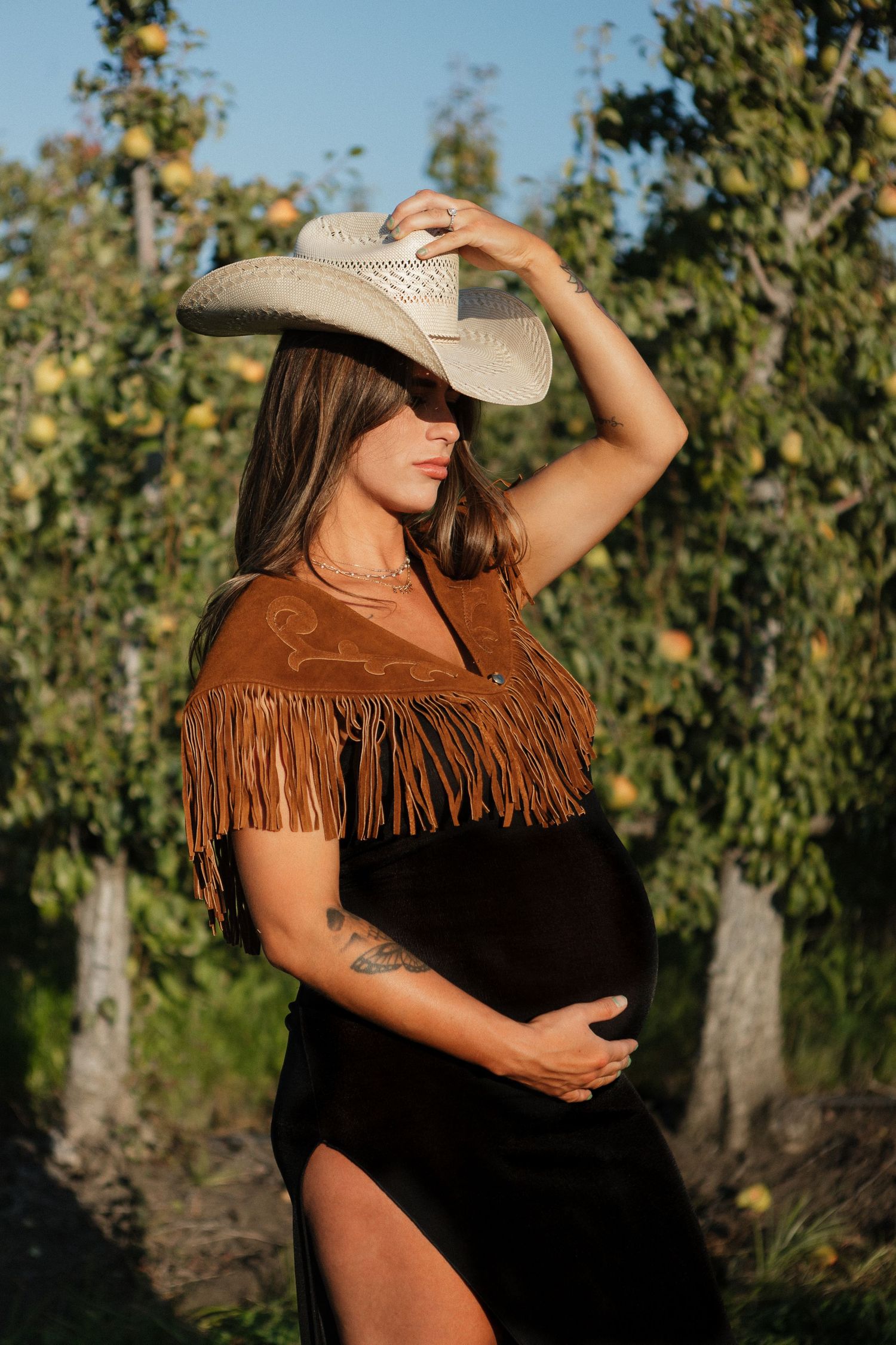 A maternity portrait with western flair in Caddo Mills, Texas