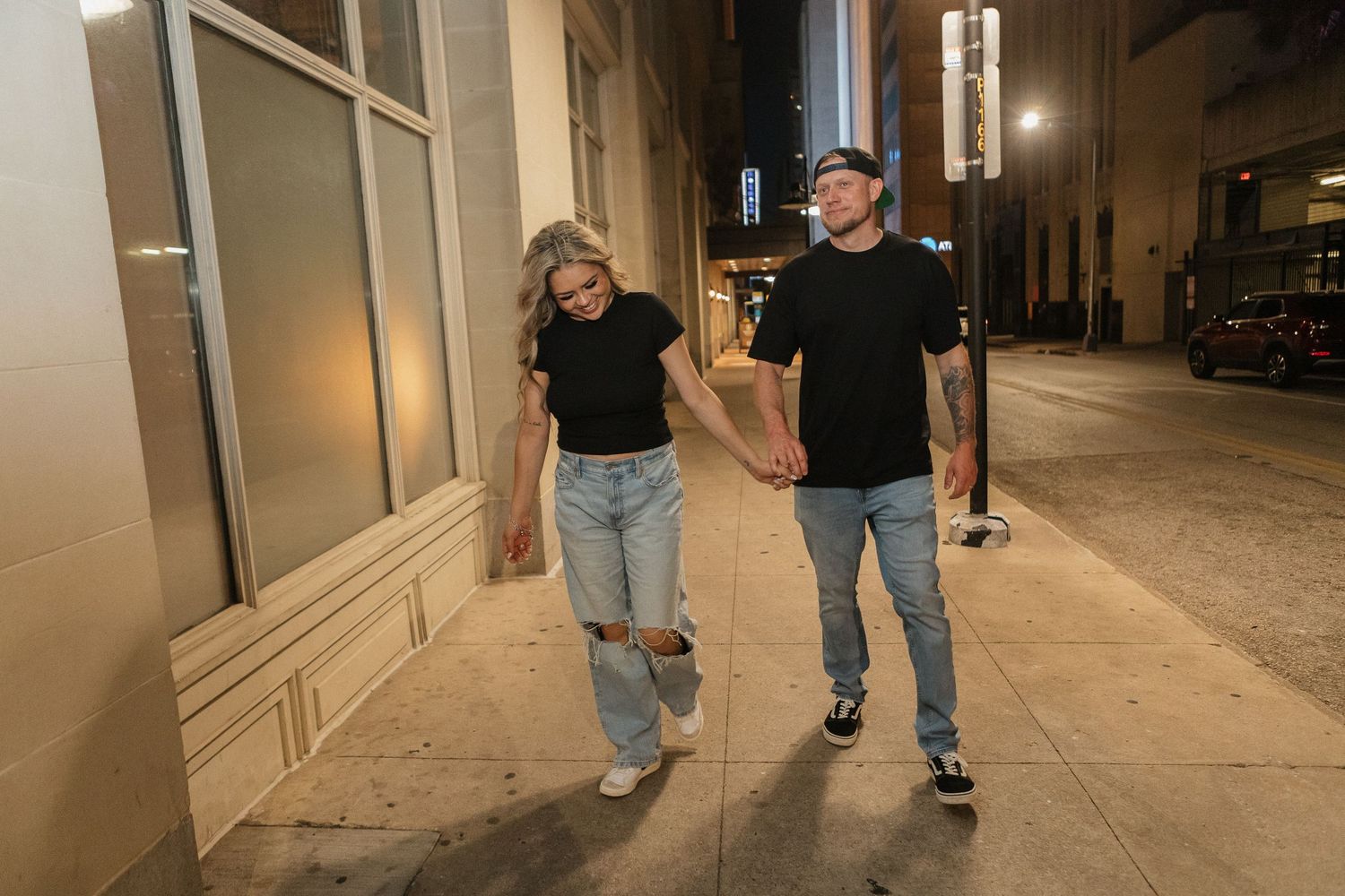 A date night couple in casual attire in Downtown, Dallas, Texas