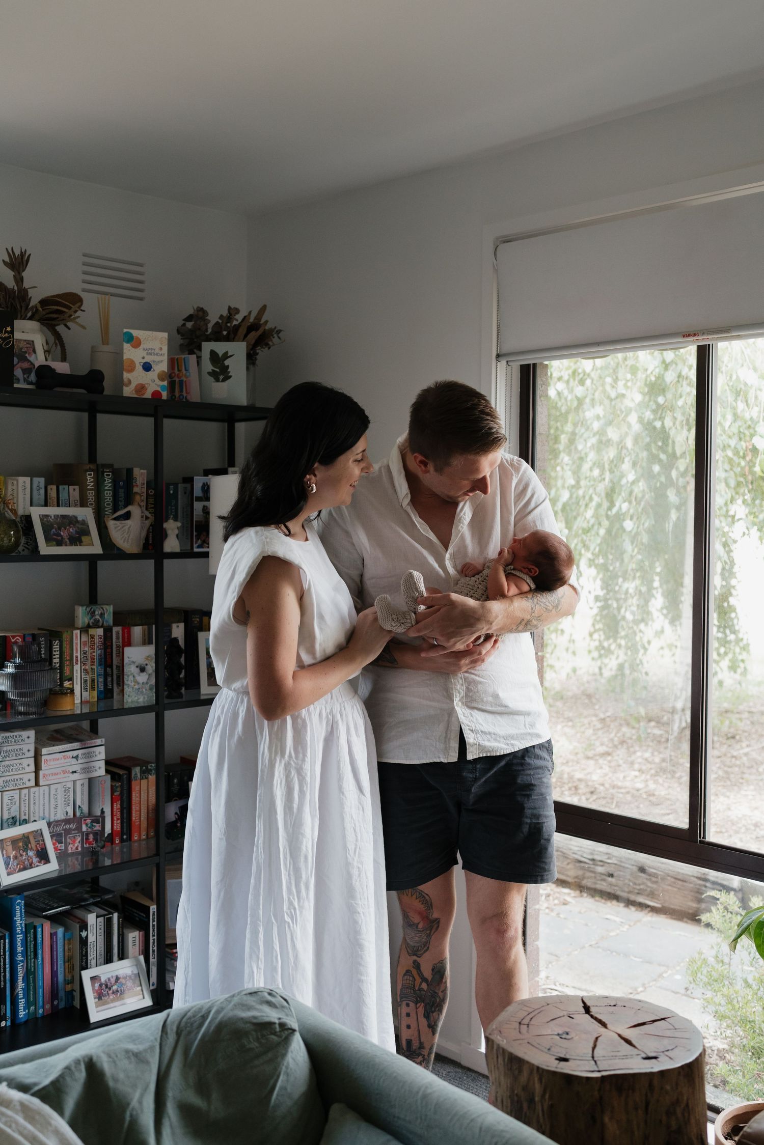 Family sharing intimate moments in a bright modern living room.