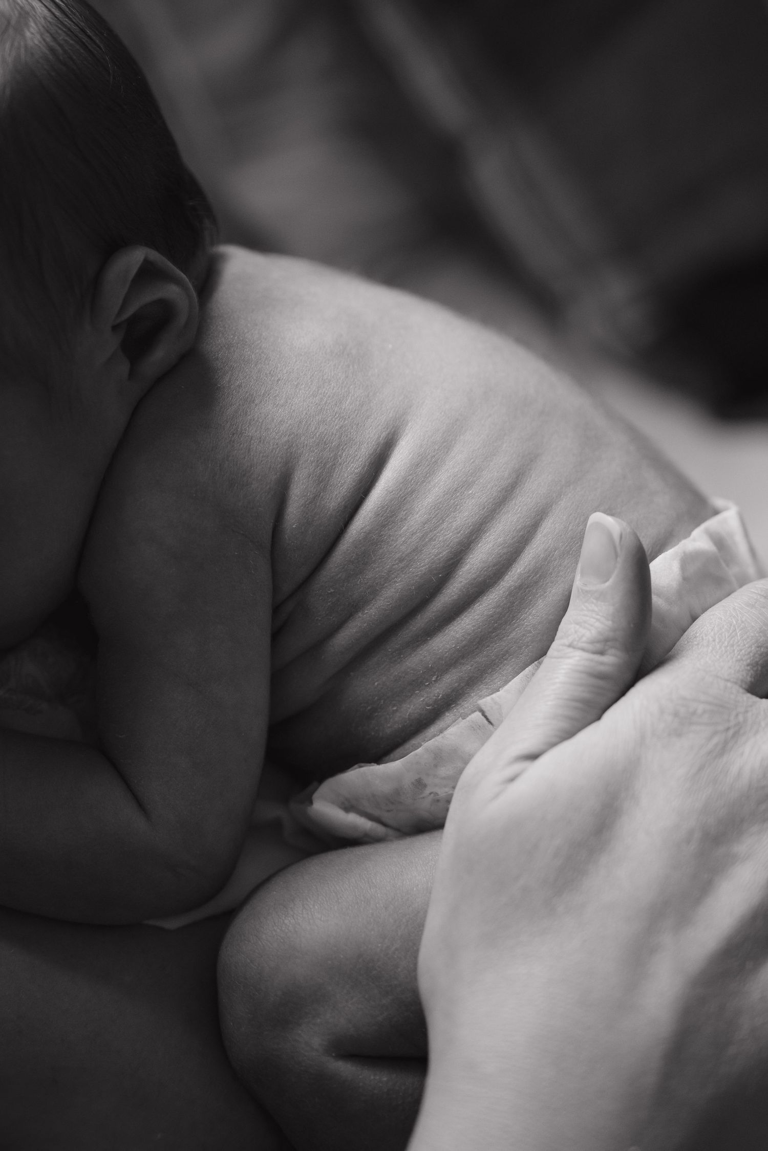 Close-up black and white photo of baby.