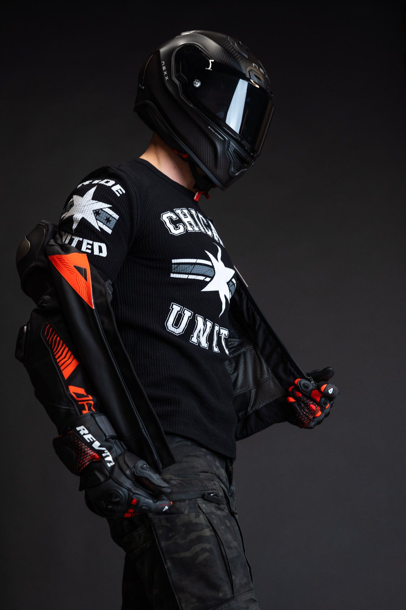 Black tactical gear and equipment displayed against dark background with United branding.