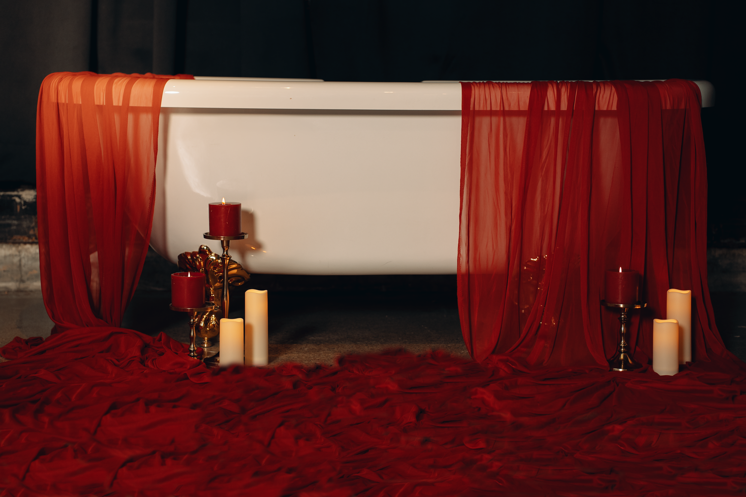 A red theater curtain gradually opens across multiple frames to reveal a stage.