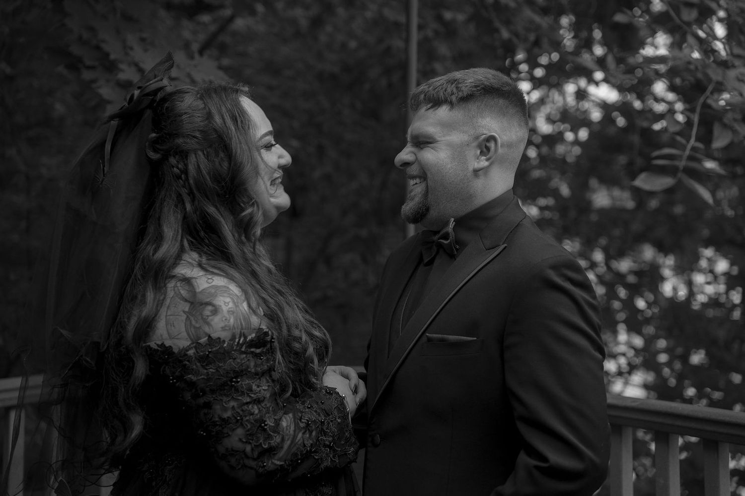 A black and white photo series showing candid moments between a couple interacting on a balcony or porch.