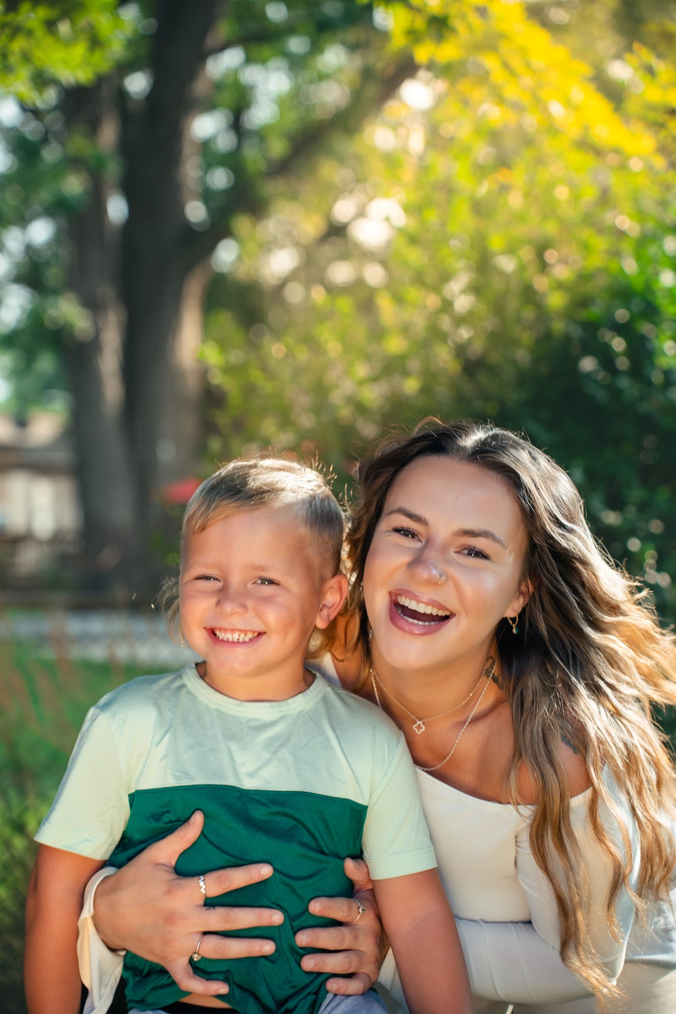 Heartwarming outdoor portrait filled with genuine laughter and joy.