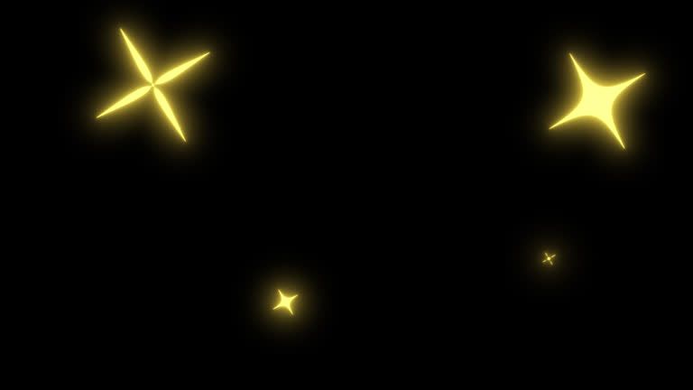 Glowing yellow stars and sparkles scattered on a black background create a magical celestial effect.