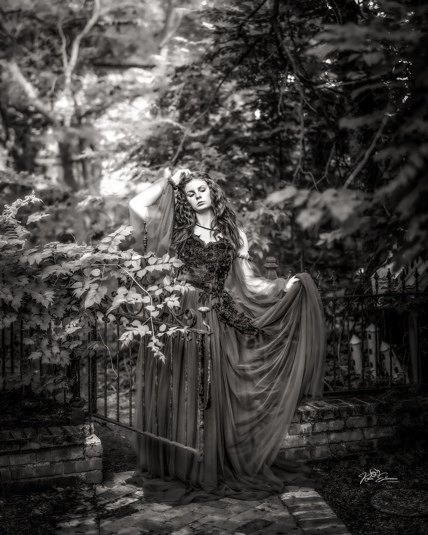 Artistic black and white portrait of a young woman surrounded by woodland beauty in Scottsdale, Arizona.