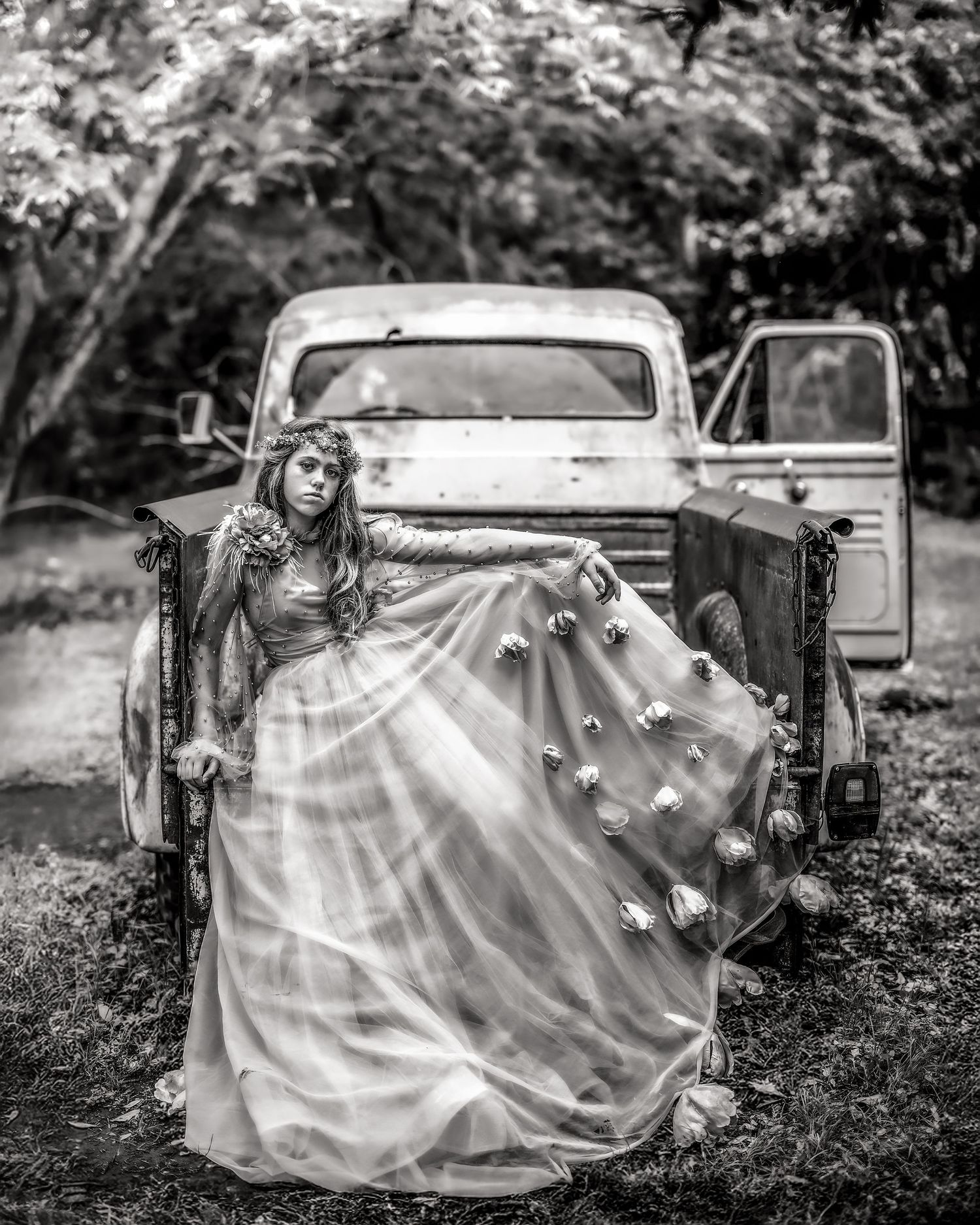Fine art black and white portrait of a girl beside a vintage truck by Scottsdale, Arizona photographer Kristin Ellermann.