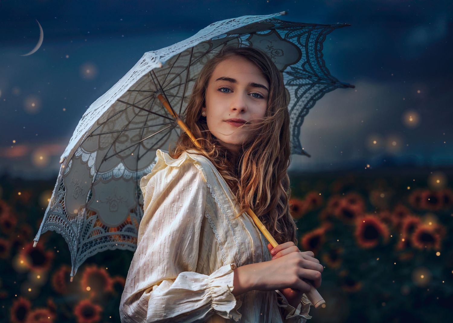 Young woman with lace umbrella in dreamy sunflower field under crescent moon.
