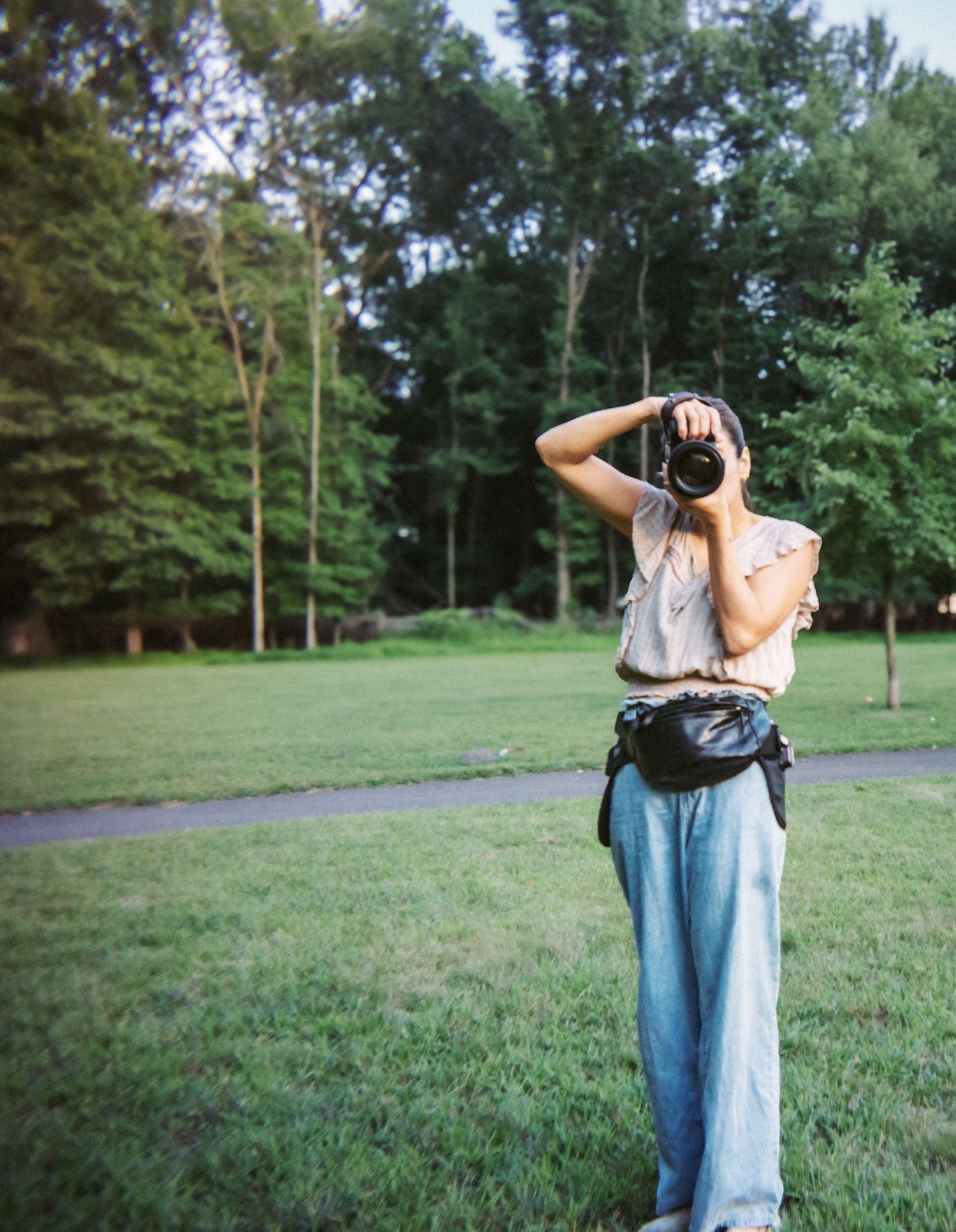female taking photographs
