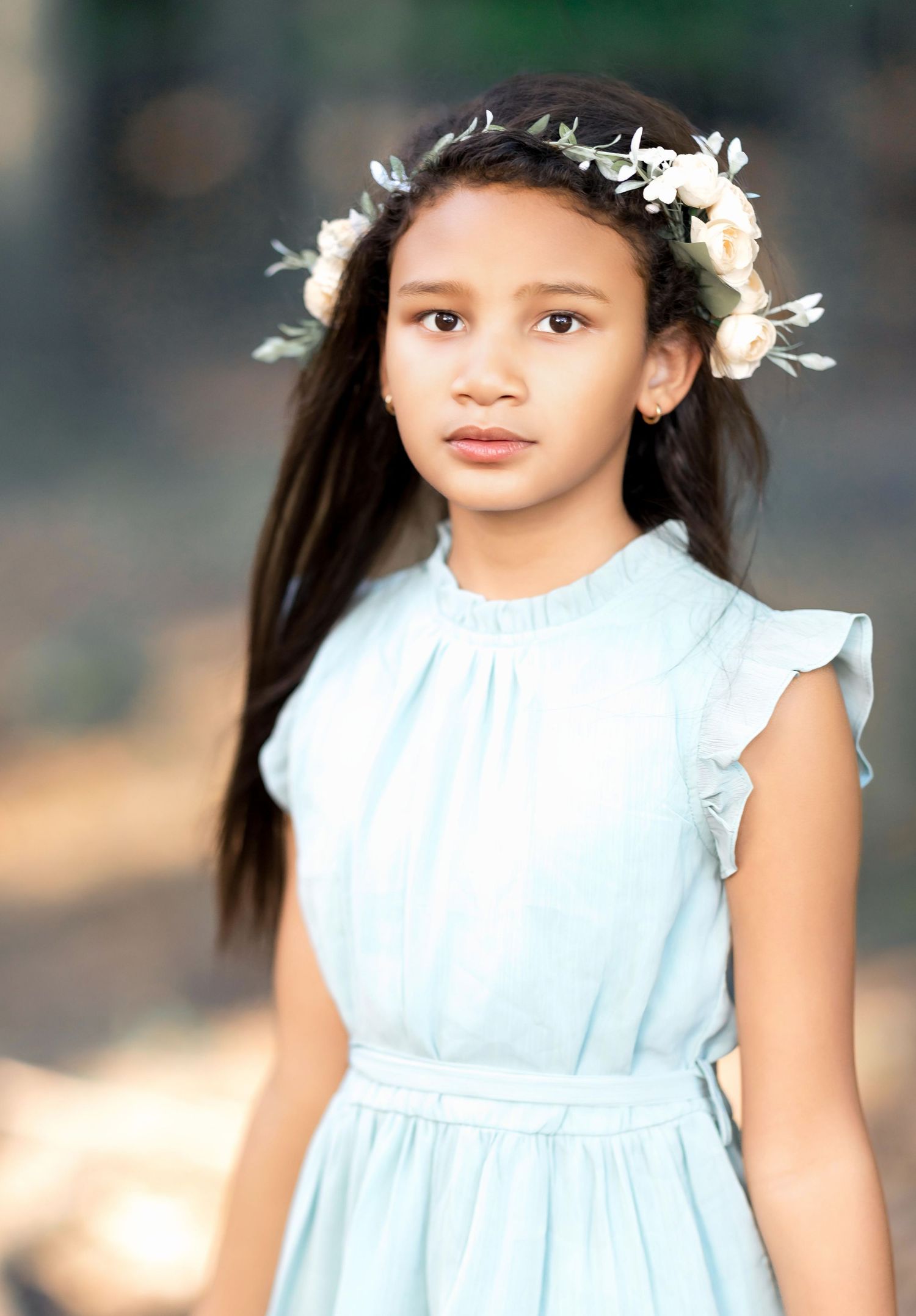 young girl with flowers in her hair
