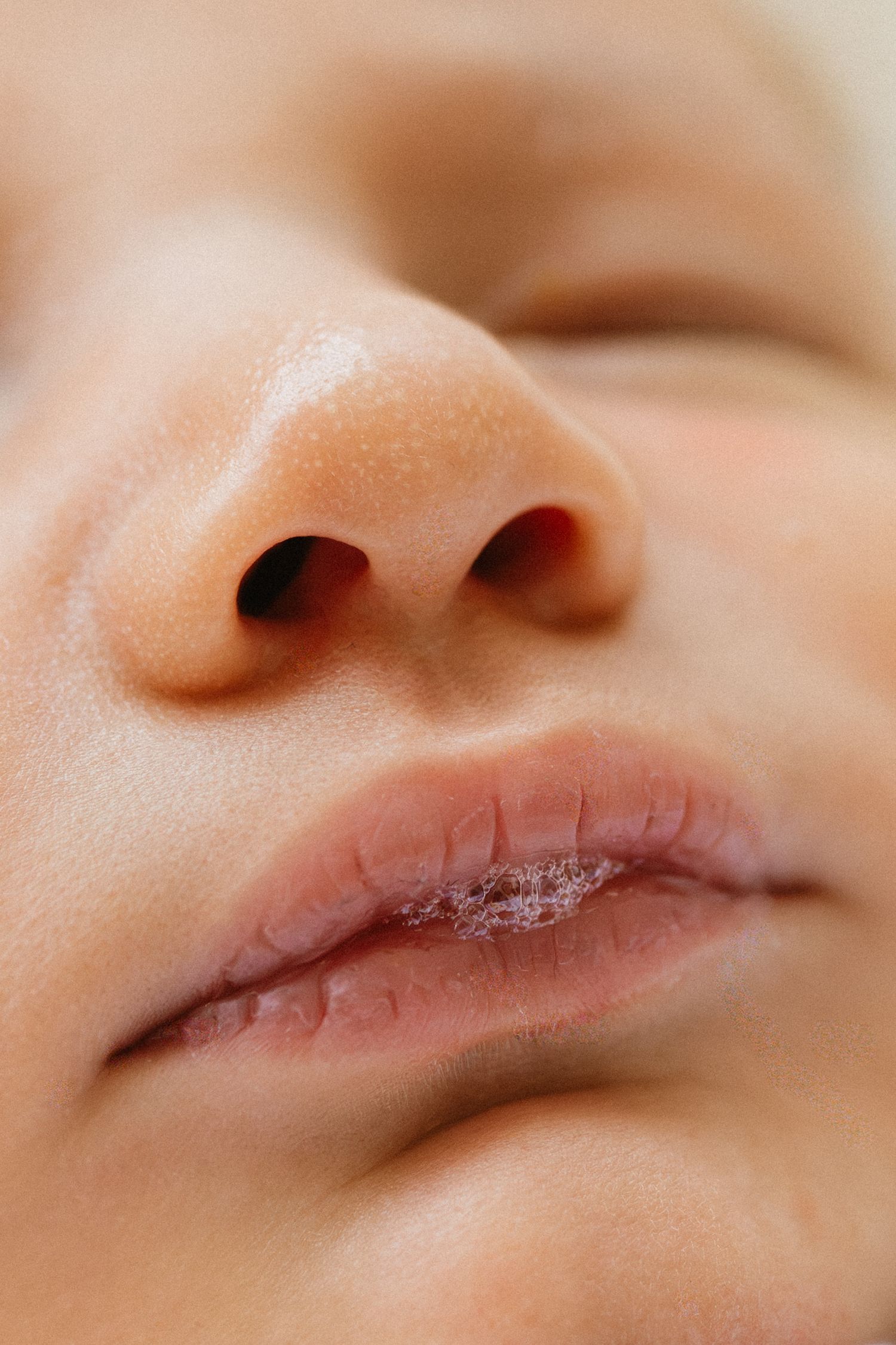 Close-up macro shots of lips showing various angles and details of the mouth and skin texture.
