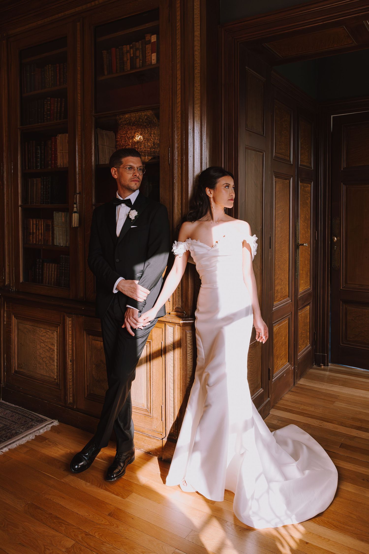 A series of wedding photos showing a couple dancing in an elegant wood-paneled room with dramatic lighting.