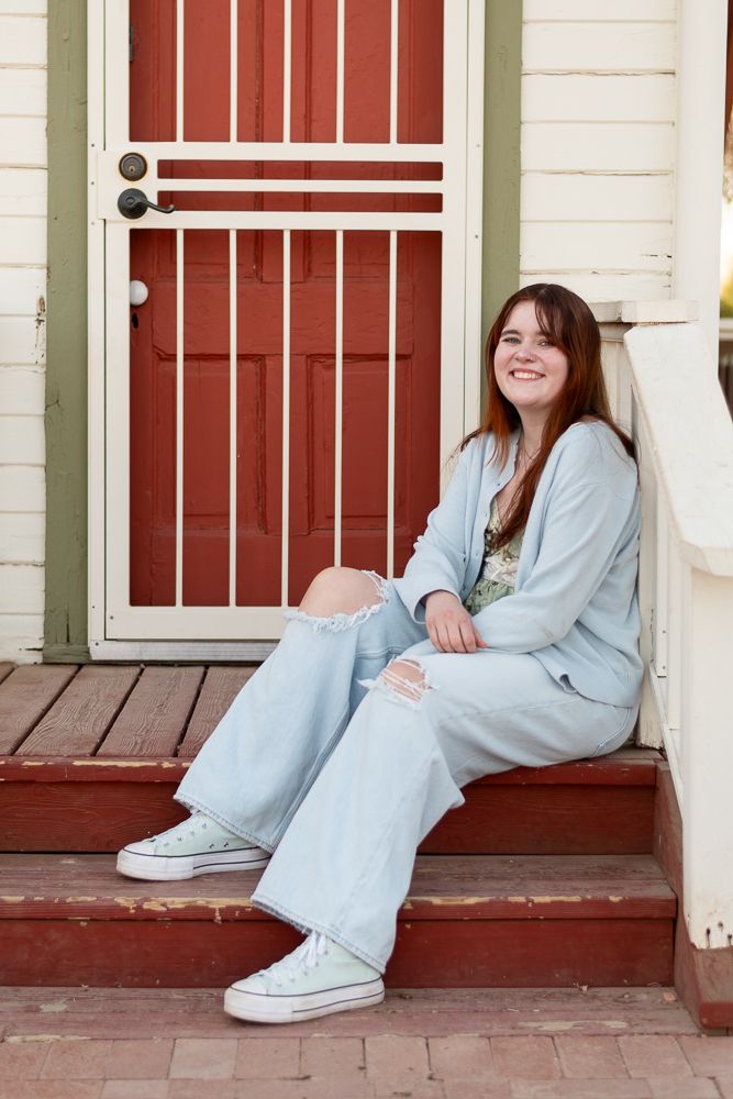 Moon Valley senior portrait photographer - high school girl at red door outdoor portrait session Phoenix AZ