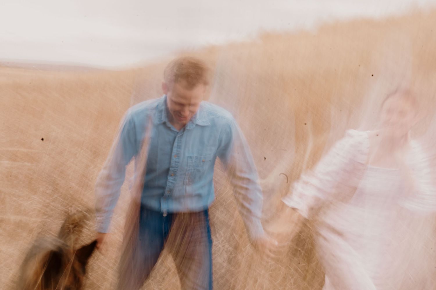 Vintage sepia-toned photo collage showing a person in a light blue shirt against a soft beige background.