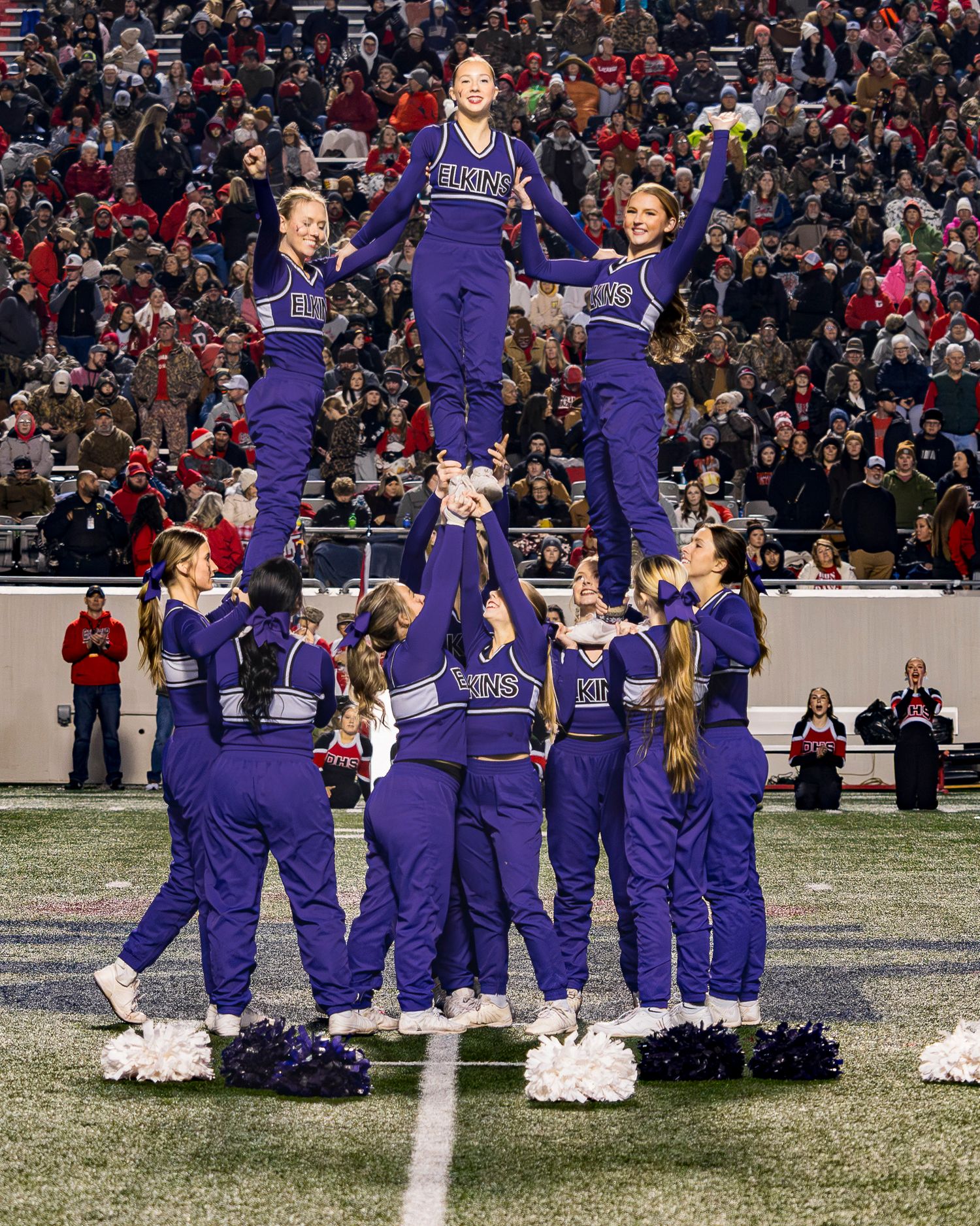 Elks Elks varsity cheerleaders perform in the 4A Championship game at War Memorial Stadium in Little Rock