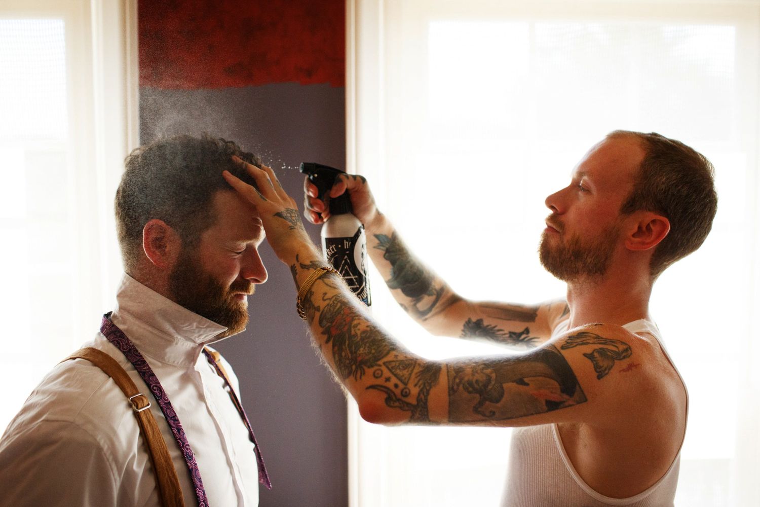 groom with a hipster and hairspray