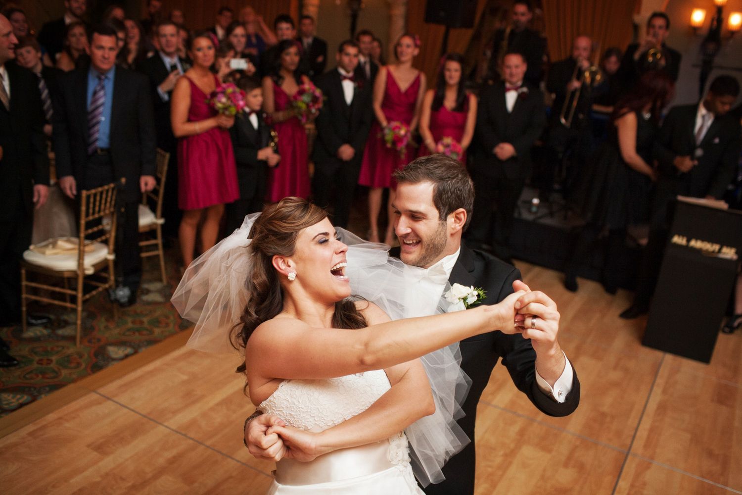 bride and groom dancing alone and having fun