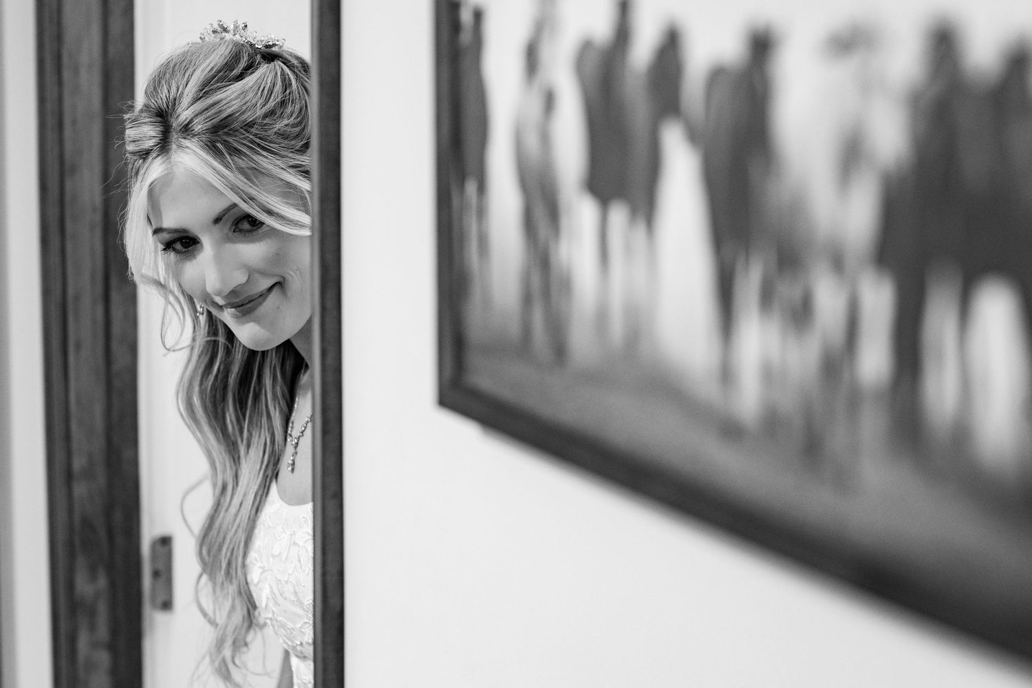 A joyful black and white photo series showing the warm connection between a couple in various happy moments.